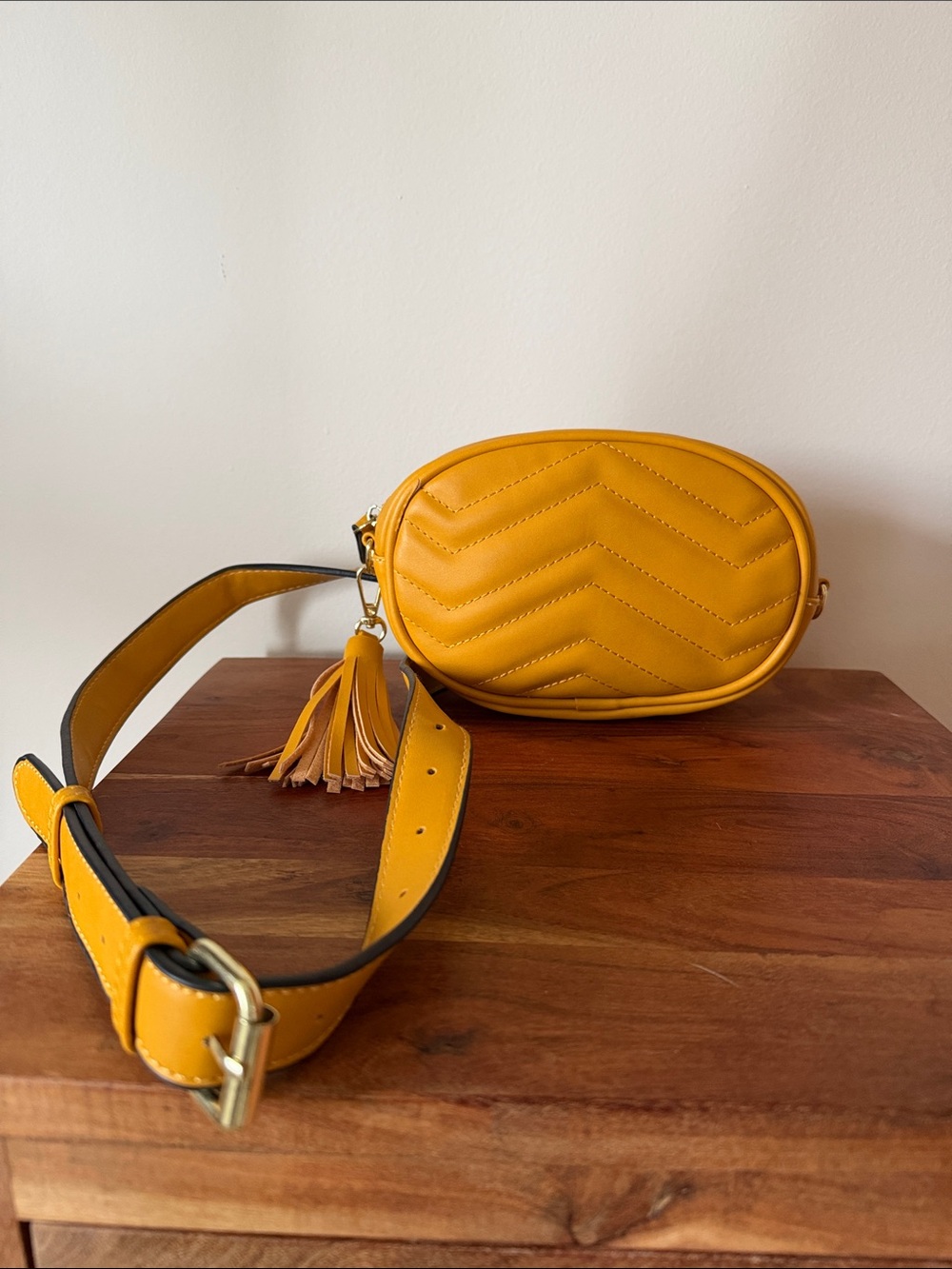 Mustard Quilted Oval Convertible Crossbody Bag with Tassel